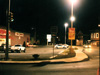 Nowadays, the corners of Vermillion and State Streets in the small town of Athens are dominated by a CVS pharmacy built in 1998. Had I taken this nighttime photo three years earlier, three houses and a long-closed Gulf gas station would have been visible where the parking lot is now. To the right in the photo are the town hall and a masonic lodge.
